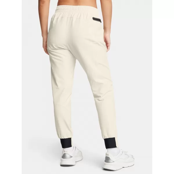  Pantaloni de trening pentru femei UNDER ARMOUR UA UNSTOPPABLE JOGGER 1376926-110 ALB 