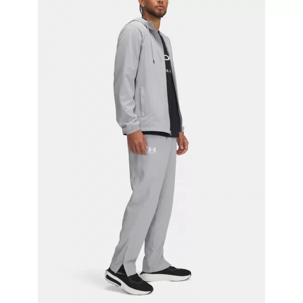  Pantaloni sport pentru bărbați UNDER ARMOUR UA RIVAL WVN WINDBREAKER PN 1390150-011 GRI 