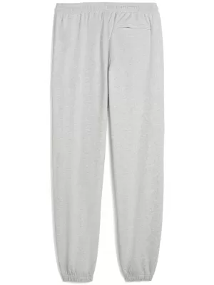 Pantaloni de trening pentru bărbați PUMA M GRAPHIC FRENCH TERRY JOGGER 52770304 ERICA GRI DESCHIS