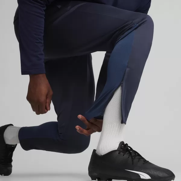  Pantaloni PUMA TEAMGOAL TRAINING PANT 658639_06 PUMA NAVY/ALB/ALBASTRU PERSAN 