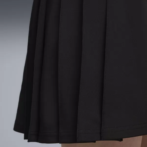  Fusta doamnelor PUMA WARDROBE ESS PLEATED SKIRT 63204601 PUMA NEGRU 