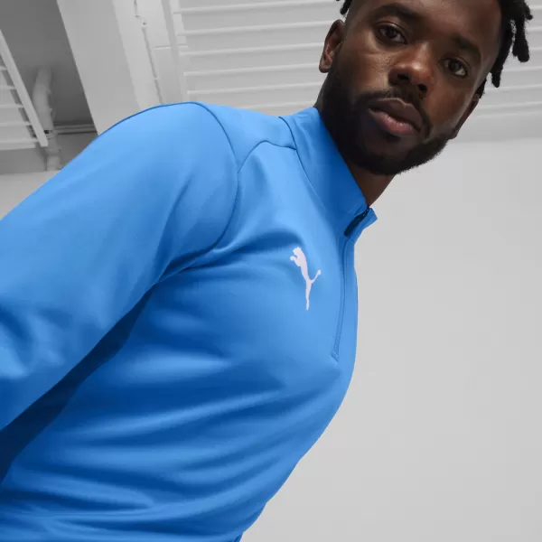  Cămaşă PUMA TEAMGOAL TRAINING 1/4 ZIP TO 658629_02 LIMONADĂ ALBASTRĂ ELECTRICĂ/ALB/ECHIPĂ REGALĂ 
