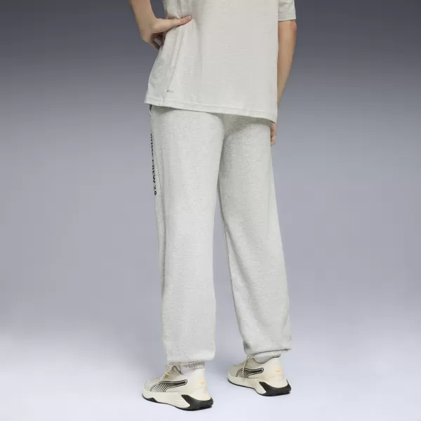 Pantaloni de trening pentru bărbați PUMA M GRAPHIC FRENCH TERRY JOGGER 52770304 ERICA GRI DESCHIS 
