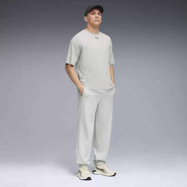  Pantaloni de trening pentru bărbați PUMA M GRAPHIC FRENCH TERRY JOGGER 52770304 ERICA GRI DESCHIS 