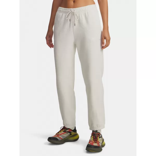 Pantaloni de trening pentru femei UNDER ARMOUR ICON TERRY VARSITY JOGGER 6004858-110 ALB 