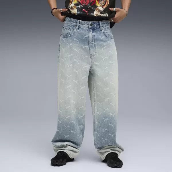  Pantaloni pentru bărbați PUMA ROCKY LASER MONOGRAM DENIM 633428-01 DENIM DECOLORAT/AOP 