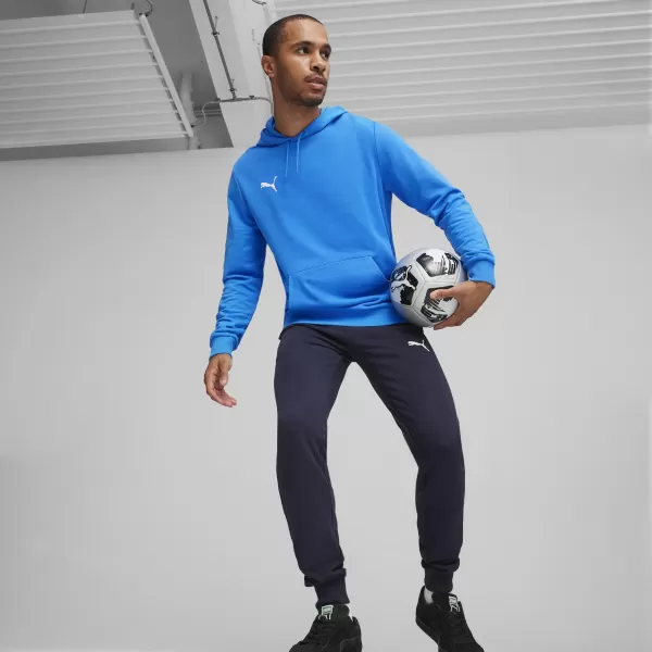  Hanorac pentru bărbați PUMA TEAMGOAL CASUALS HOODY 658618_02 IGNITE BLUE/ APRINDE ALBASTRU/ALB PUMA 