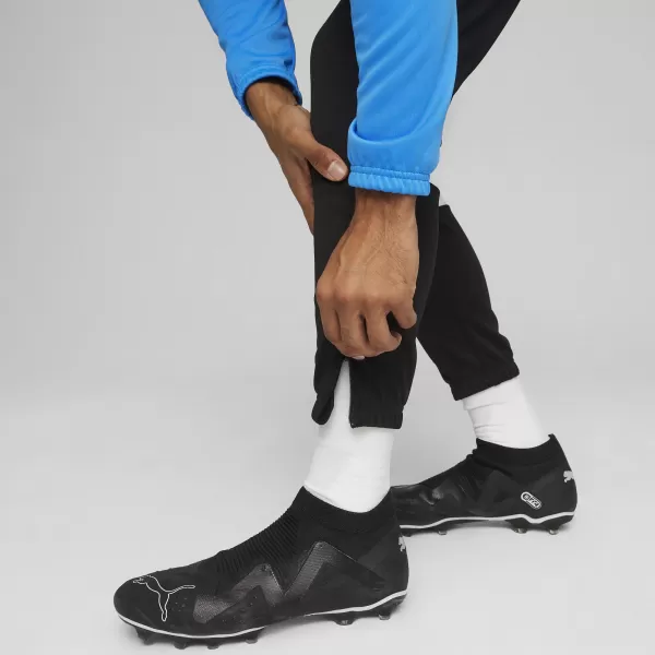  Set trening pentru bărbați PUMA TEAMRISE TRACKSUIT 658653_02 IGNITE BLUE/ APRINDE ALBASTRU/NEGRU PUMA 