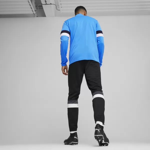  Set trening pentru bărbați PUMA TEAMRISE TRACKSUIT 658653_02 IGNITE BLUE/ APRINDE ALBASTRU/NEGRU PUMA 