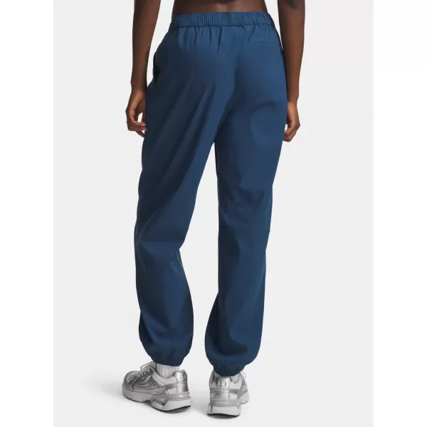  Pantaloni de trening pentru femei UNDER ARMOUR UNSTOPPABLE WVN JOGGER 6011400-498 ALBASTRU 