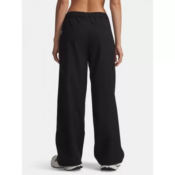  Pantaloni sport de damă UNDER ARMOUR UNSTOPPABLE WVN PANT 6014752-008 NEGRU 