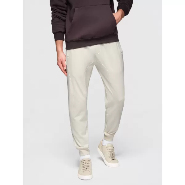  Pantaloni de trening pentru bărbați OMBRE OM-PABS-0305 CREMĂ 
