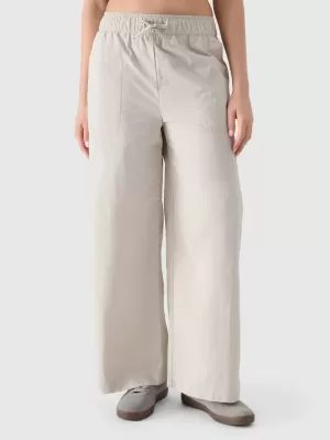 Pantalonii pentru doamne 4F WSS25TTROF1012 BEJ