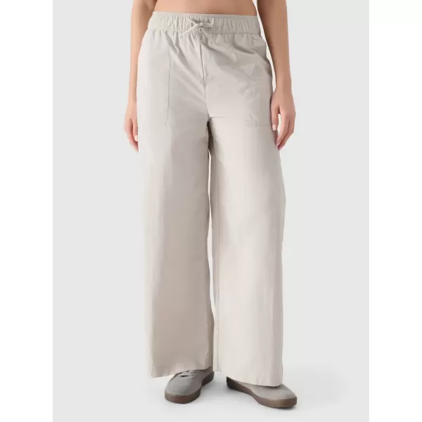  Pantalonii pentru doamne 4F WSS25TTROF1012 BEJ 