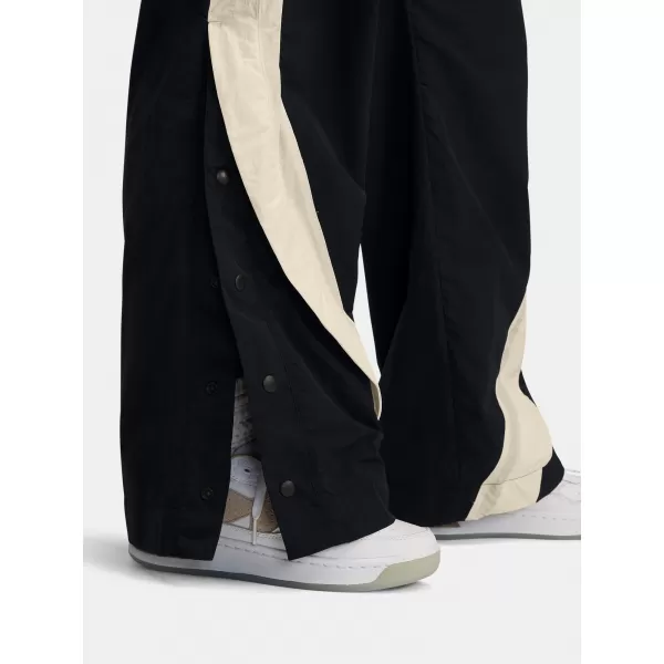  Pantaloni sport de damă UNDER ARMOUR ICON CRINKLE TEAR-AWAY PANT 6000277-001 NEGRU 