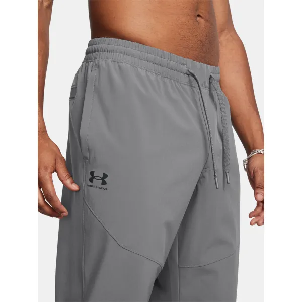  Pantaloni de trening pentru bărbați UNDER ARMOUR VIBE WOVEN JOGGER 1386557-025 GRI 