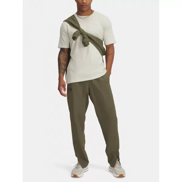  Pantaloni sport pentru bărbați UNDER ARMOUR RIVAL WVN WINDBREAKER PN 1390150-390 VERDE 