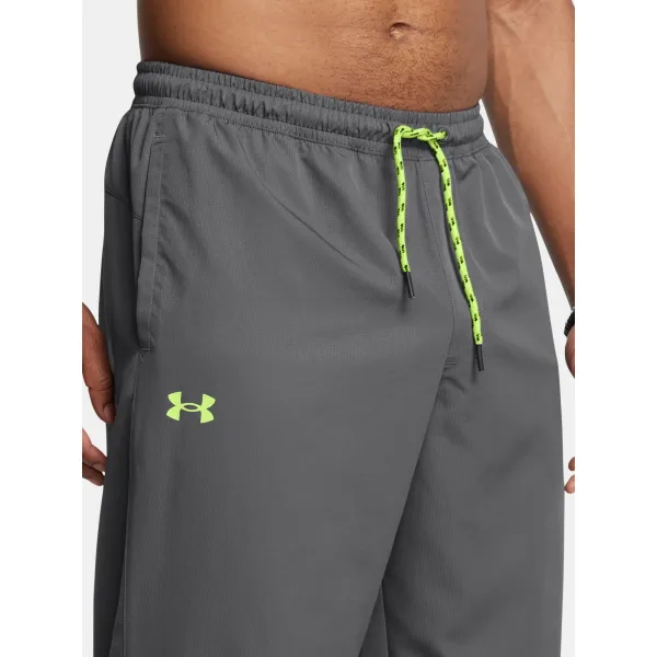  Pantaloni sport pentru bărbați UNDER ARMOUR ICON LEGACY WINDBKR PANT 1382876-025 GRI 