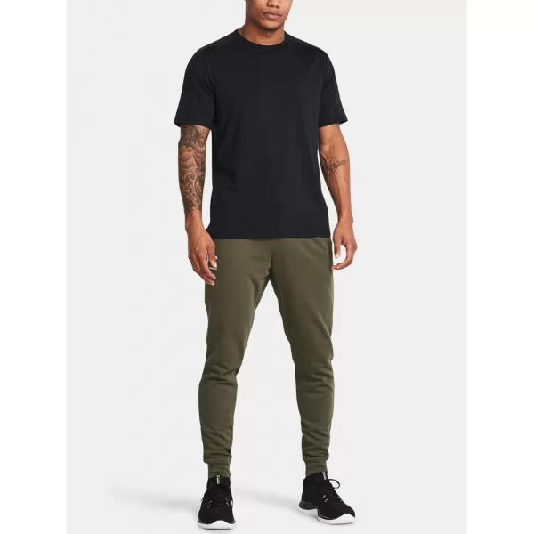  Pantaloni de trening pentru bărbați UNDER ARMOUR RIVAL TERRY JOGGER 1380843-390 VERDE 