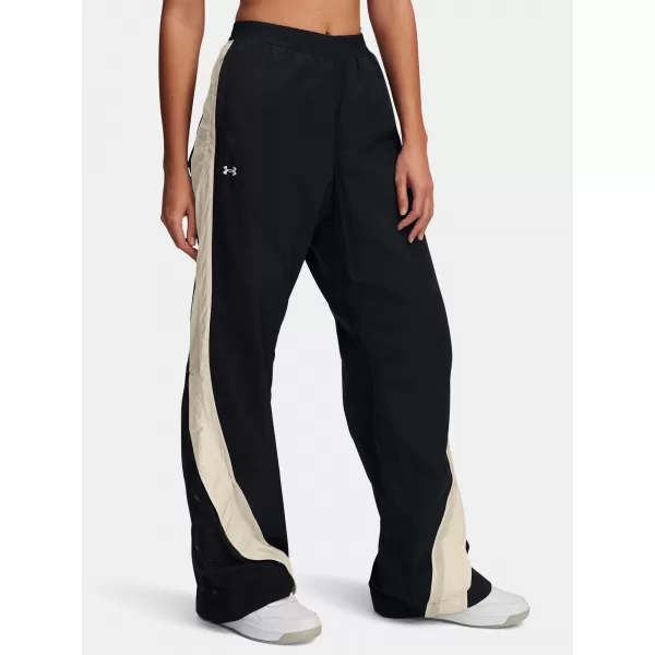  Pantaloni sport de damă UNDER ARMOUR ICON CRINKLE TEAR-AWAY PANT 6000277-001 NEGRU 