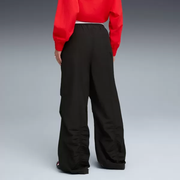  Pantalonii pentru doamne PUMA WARDROBE ESS PARACHUTE WOVEN PANTS OP 632044-01 NEGRU 