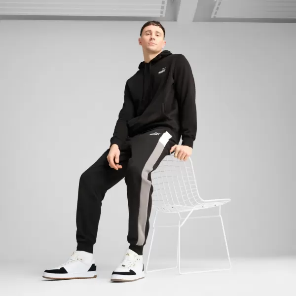  Pantaloni de trening pentru bărbați PUMA ESS BLOCK SWEATPANTS FL CL 684688-01 NEGRU 